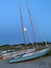 beached sailboats