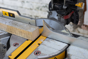 Circular saw with a sharp saw. Making furniture with a professional tool