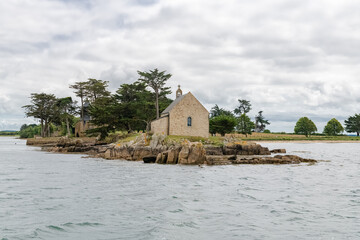 Boedic island, with the chapel, in the Morbihan gulf,  on the coast
