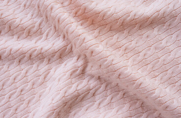 Seamless knitted fabric with pigtails. Knitted sweater, plaid, scarf. Knitted background