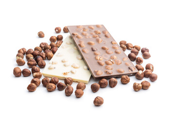 White and dark chocolate bars with hazelnuts.