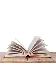 isolated open book on the wood table on the white background with copy space