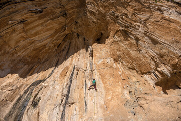 The girl climber climbs.