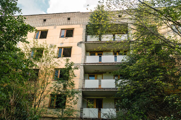 Fototapeta na wymiar Decaying apartment blocks in Pripyat, Ukraine in the Chernobyl Exclusion Zone