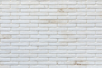 Aged, white painted brick wall. Brick texture. Rustic