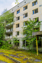 Fototapeta na wymiar Vertical view of decaying residential apartment blocks in Pripyat, Ukraine in the Chernobyl Exclusion Zone