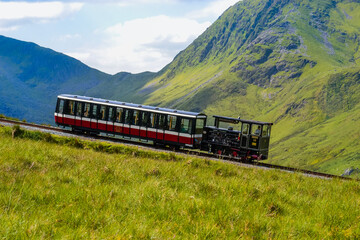Views of Snowdonia National Park and the old iron dog with the old train going up the mountains © Delia_Suvari