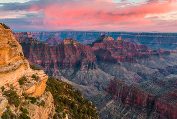Fototapeta na wymiar Sunset on Thunderstorm Clouds Moving Across Roaring Springs Canyon, Bright Angel Point Trail, North Rim, Grand Canyon National Park, Arizona, USA