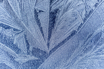Frost pattern on a cold winter morning on the bonnet of a car