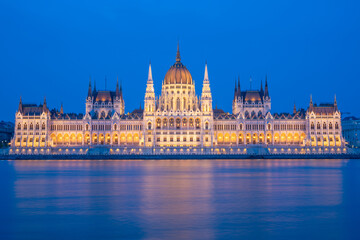 The famous parliament building in Budapest, Hungary during blue hour, illuminated