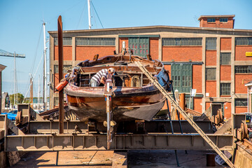 Den Helder, the Netherlands. 8 july 2021. Historic flatboat on the slipway at the Willemsoord shipyard in Den Helder.
