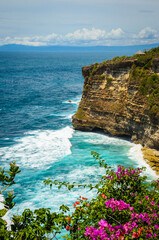 Beautiful Uluwatu coast with rocks and ocean waves, Bali, Indonesia