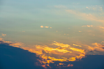 Beautiful view of yellow orange cloudy sky on sunset. Nature backgrounds. Greece. 