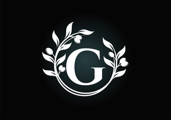 Obraz premium Initial letter G sign symbol with olive branch wreath. Round floral frame made by the olive branch. Agriculture industry logo design vector template. Olive oil label
