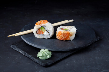 Gourmet sushi on black background