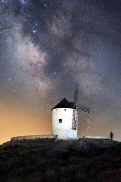 Milky way on old windmill nightscape with stars