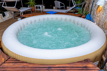 Hot Tub at a Luxury Resort. Outdoor hot tub and sea view © nedomacki