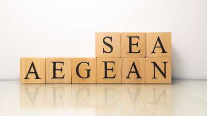 The phrase Aegean Sea was created from wooden letter cubes. Words and holidays.