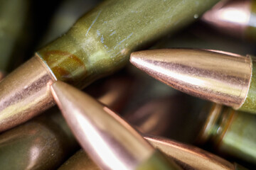 Live ammunition for automatic weapons or rifles ranked. Close-up view.