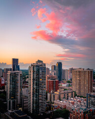 Beautiful colorful sunset Entire futuristic city skyline view of downtown Toronto Canada. Modern buildings, urban architecture, cars travelling. Construction and development in a busy city
