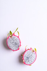 Half dragon fruit or pitaya on white background with copy space, Tropical fruit