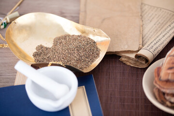 Chinese herbal medicine Cnidium in the weighing pan