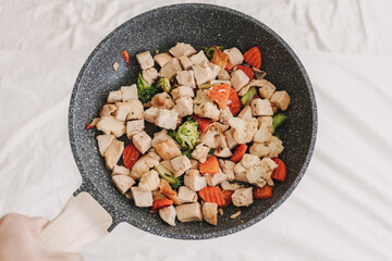 Homemade Stir fried chicken with mixed vegetables.