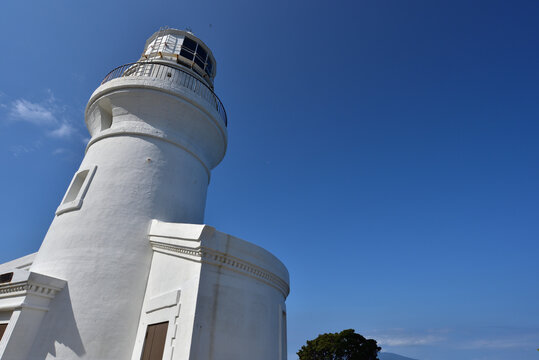 a lighthouse and blue sky in Yakushima, Kagoshima, Japan 