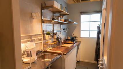View of a traditional kitchen with a microwave oven table and cabinets.modern kitchen with nice cabinet