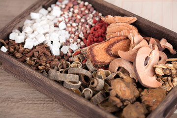 Wooden box filled with various Chinese medicines