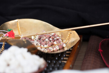 The weighing pan with Chinese medicine Gorgon is on the abacus
