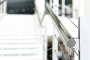 Metallic railing on staircase in building