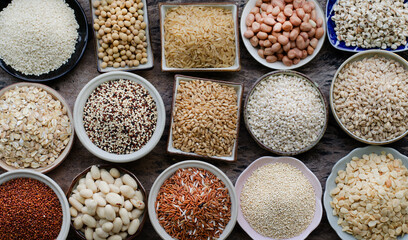 Variety kind of dry organic cereal and grain seeds in wooden bowl, for healthy or clean food ingredient or agricultural product concept