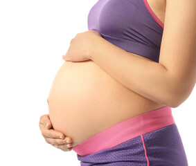Young pregnant woman on white background