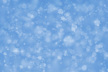 Abstract glitter bokeh with blue on leaf pattern background.