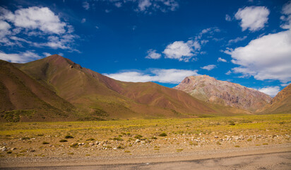 Fototapeta na wymiar View of mountains and valley near Las Lenas in summer day. Andes, Argentina