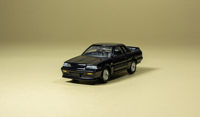 model car on yellow background