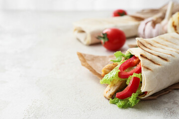 Tasty doner kebab on light background, closeup