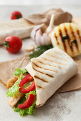 Tasty doner kebab on light background, closeup