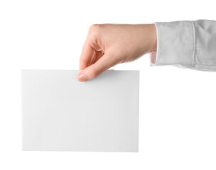 Obraz premium Woman holding blank sheet of paper on white background, closeup