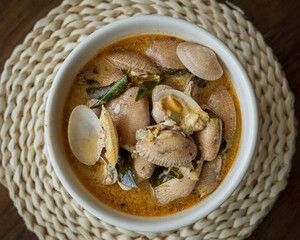 Chilli Butter Cream Clam served in a bowl on a table.