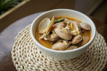 Chilli Butter Cream Clam served in a bowl on a table.