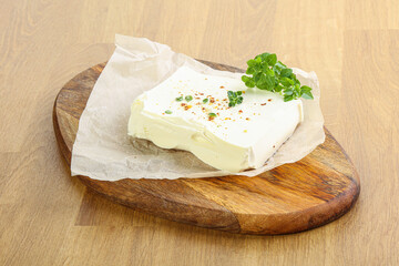 Greek Feta cheese over board