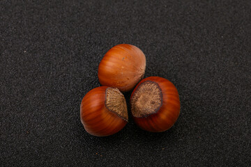 Obraz premium Hazelnut heap isolated over background