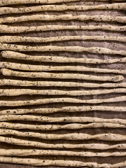 Ready to put in owen bread-sticks closeup view of