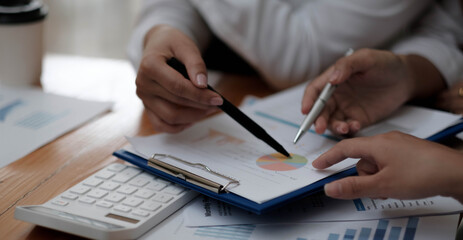 Close up Business people meeting to discuss the situation on the market. Business Financial Concept