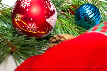 christmas tree decorations toys on a pine branch