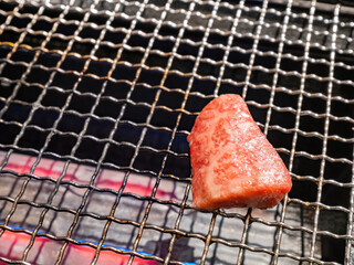 Close up shot of grilling meat