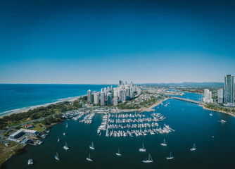 An aerial panorama view of Surfers Paradise including the Southport Yacht Club, Sundale Bridge and Pacific Ocean