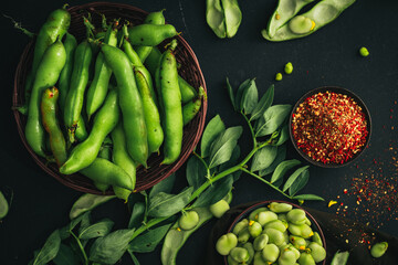 Broad bean. Fresh broad beans with spices. Green beans. - obrazy, fototapety, plakaty